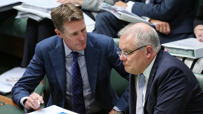 Christian Porter speaks with Scott Morrison in the House of Representatives