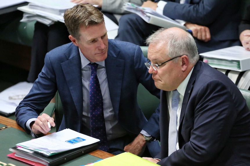 Christian Porter speaks with Scott Morrison in the House of Representatives