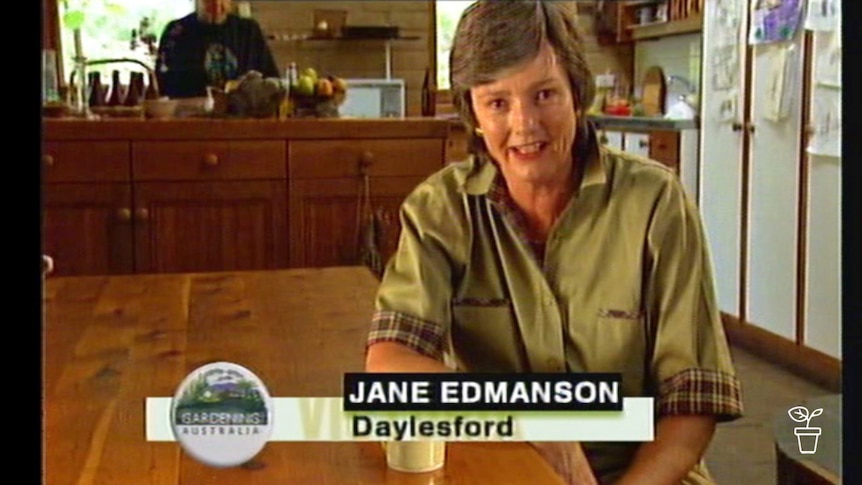 Lady sitting at a kitchen table with text 'Jane Edmanson, Daylesford.'