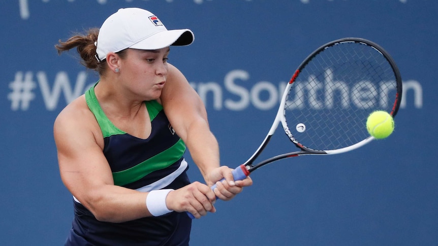 Australia's Ash Barty returns to Denmark's Caroline Wozniacki at the Cincinnati Open.