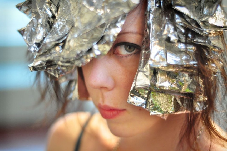 A woman with her hair covered in foils for a story about the dos and don'ts of colouring hair at home.