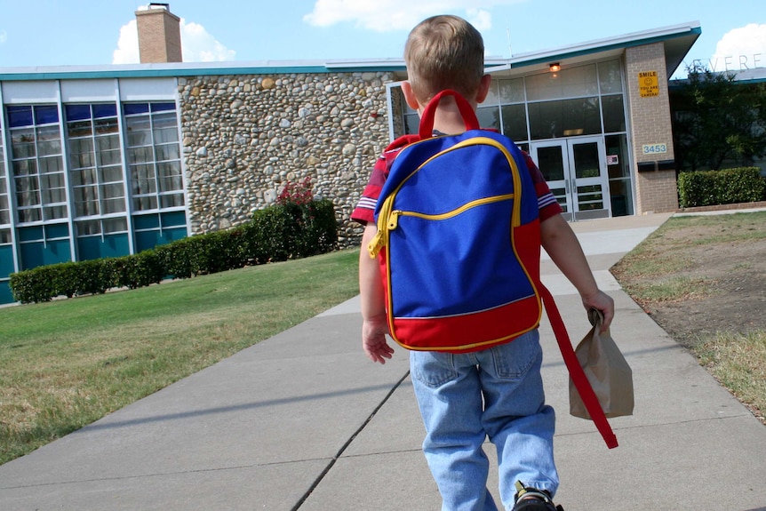 Child walking into school