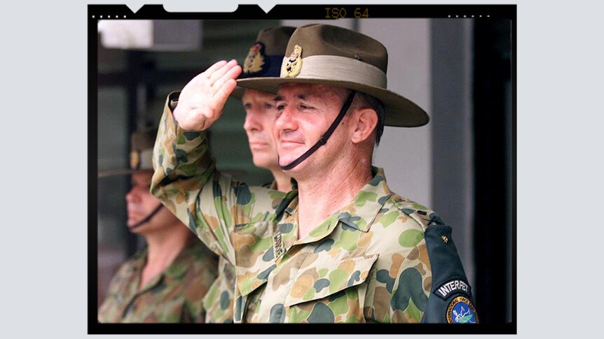 Major General Peter Cosgrove salutes in uniform