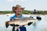 Barramundi farmer Dan Richards on his fish farm.