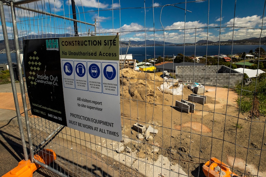 Perimeter fence at building site.