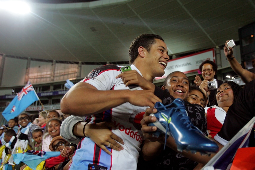 Jarryd Hayne celebrates with Fiji fans