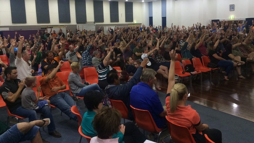 Residents of Queensland mining town Blackwater rally to save jobs.