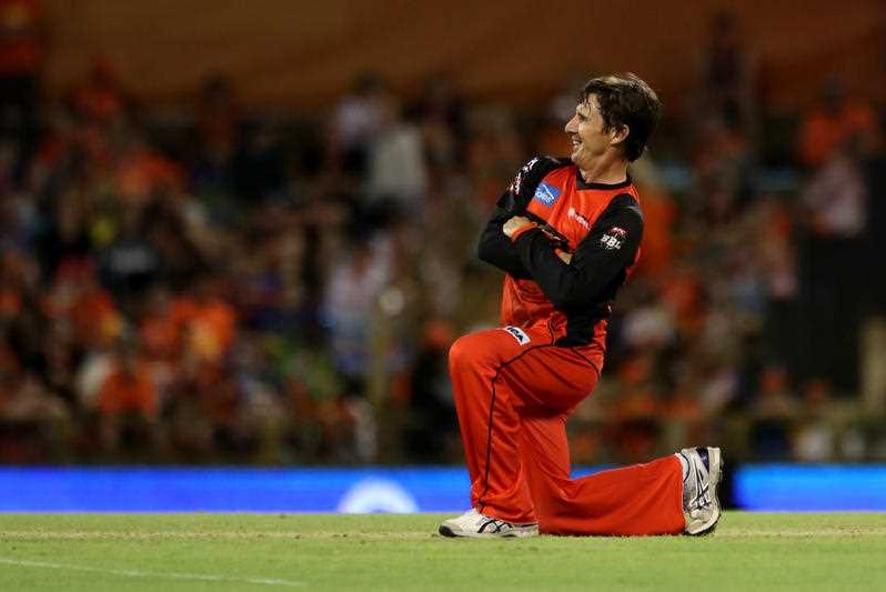 Brad Hogg of the Renegades appeals on one knee for a wicket during the Big Bash League