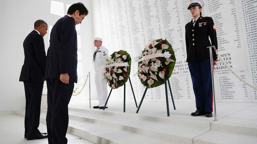Barack Obama and Japanese Prime Minister Shinzo Abe participate in a wreath laying ceremony.