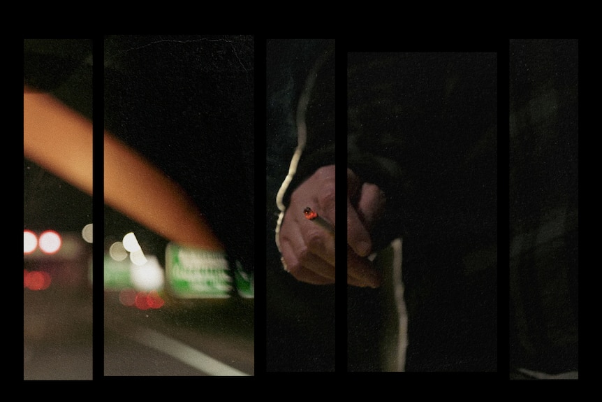 A composite image of an out of focus road sign by a highway and a man's hand holding a lit cigarette at night.