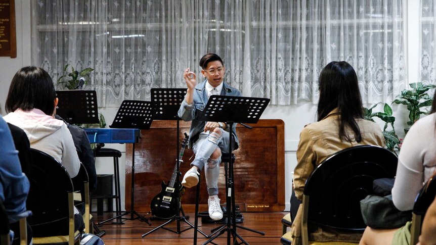 Mikey Tai delivering his sermon at Providence Church in Sunnybank, Brisbane.