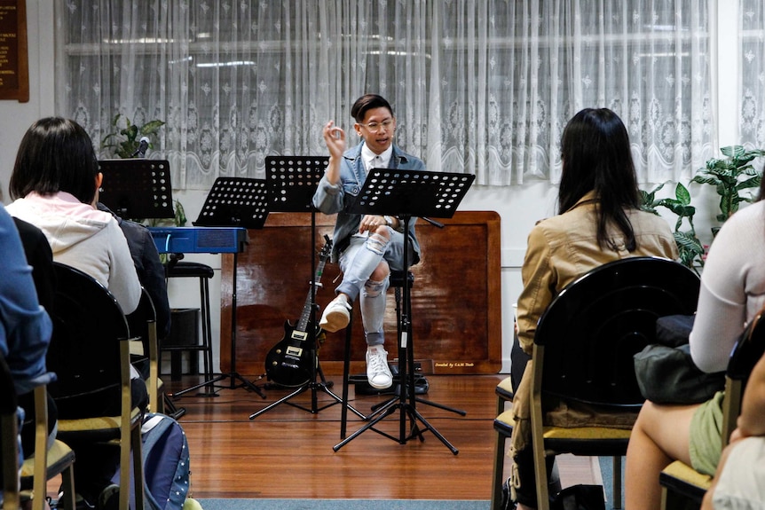 Mikey Tai delivering his sermon at Providence Church in Sunnybank, Brisbane.