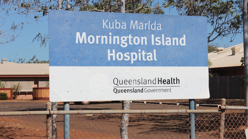 The faded sign outside Mornington Island Hospital.