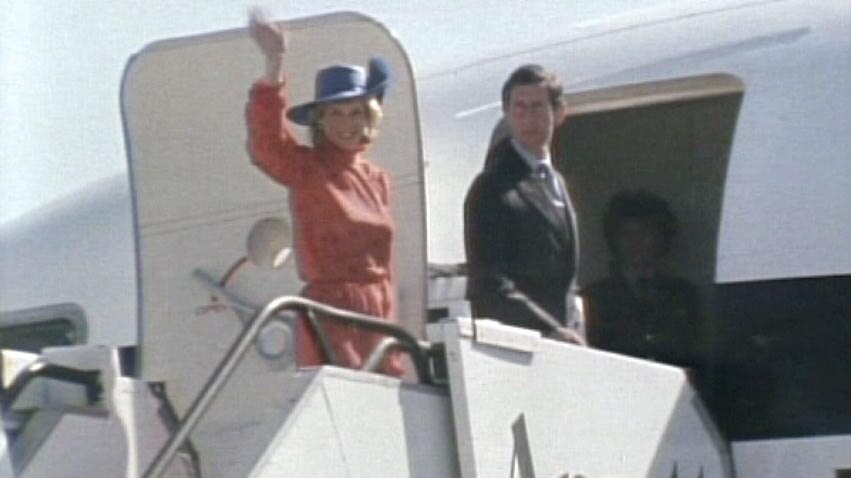 Prince Charles and Princess Diana wave goodbye as they board a plane during the 1983 Royal tour.