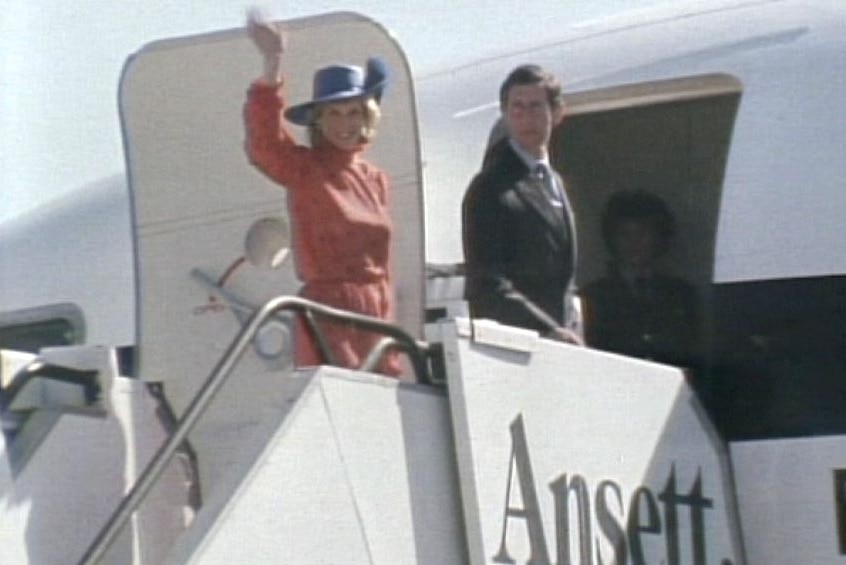 Prince Charles and Princess Diana wave goodbye as they board a plane during the 1983 Royal tour.