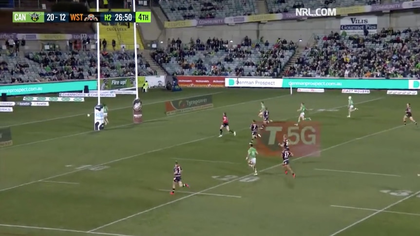 A screengrab of a broadcast of a rugby league player escaping the in-goal area