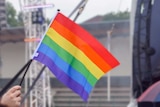 A gay pride rainbow flag.