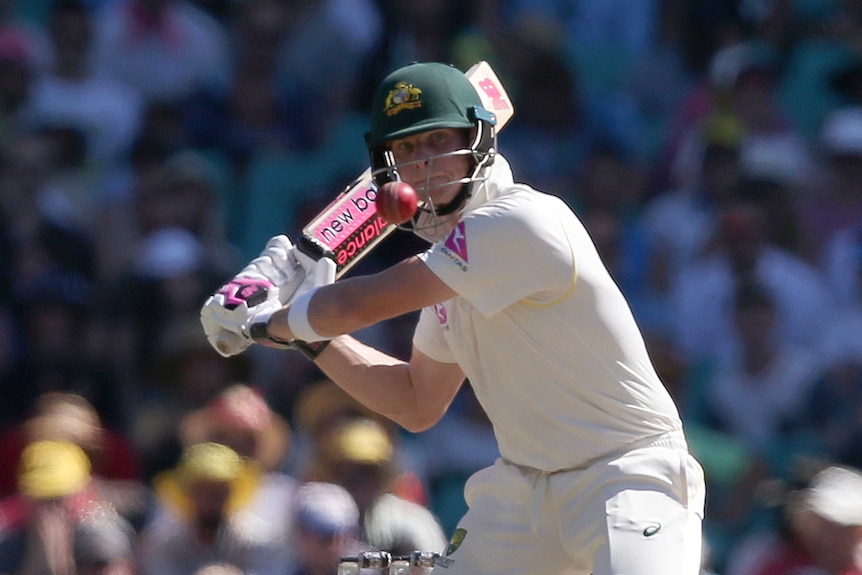 Steve Smith playing a shot in Test cricket for Australia.