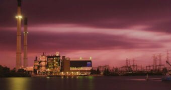 An AGL power station on Port River in South Australia at dusk.