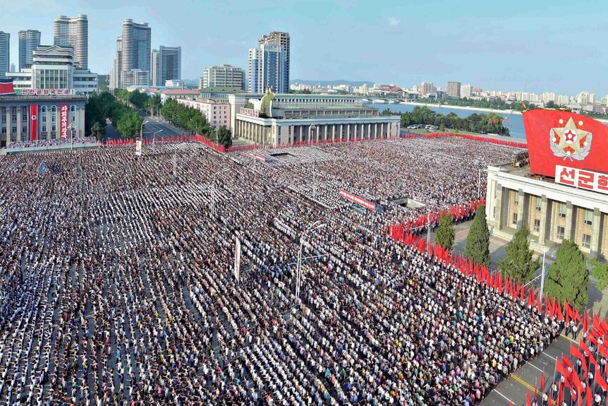 A general aerial view of thousands of people rallying in Pyongyang.