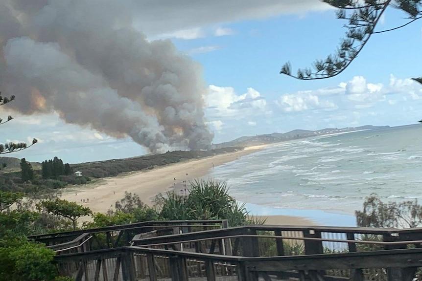 Smoke billows from Peregian Beach.