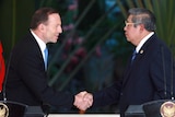 Tony Abbott shakes hands with Indonesian president Susilo Bambang Yudhoyono.