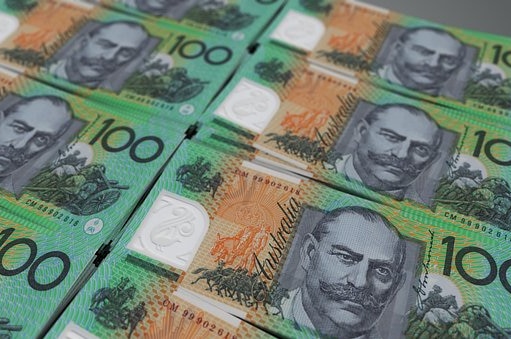 Rows of Australian hundred dollar bills.