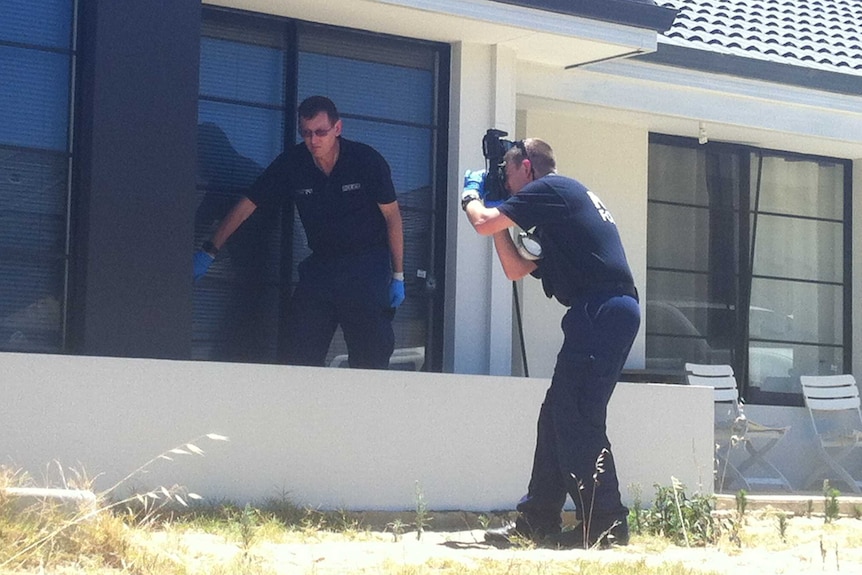 Forensics collect evidence at Landsdale house