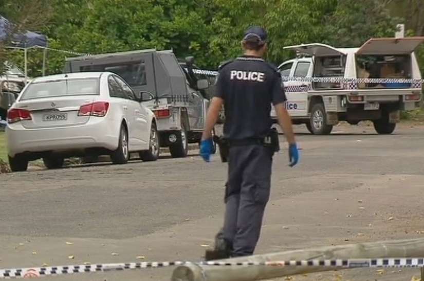 Police investigate where a 21-year-old man was found lying on a road in Ernest Street at Tewantin