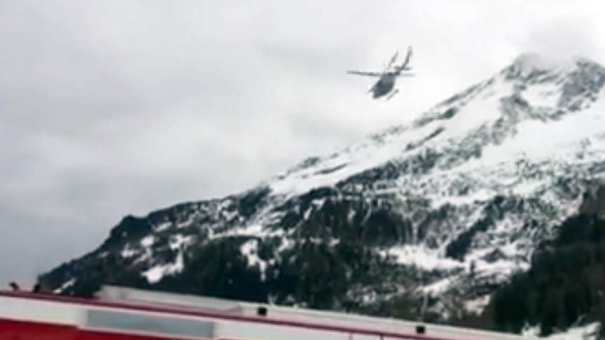 Helicopters attend to avalanche rescue