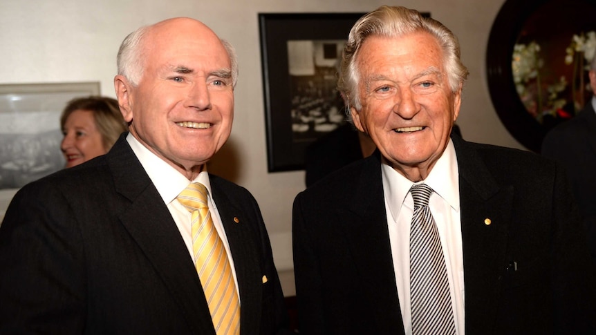 Former prime ministers LtoR John Howard and Bob Hawke at the National Press Club in Canberra.