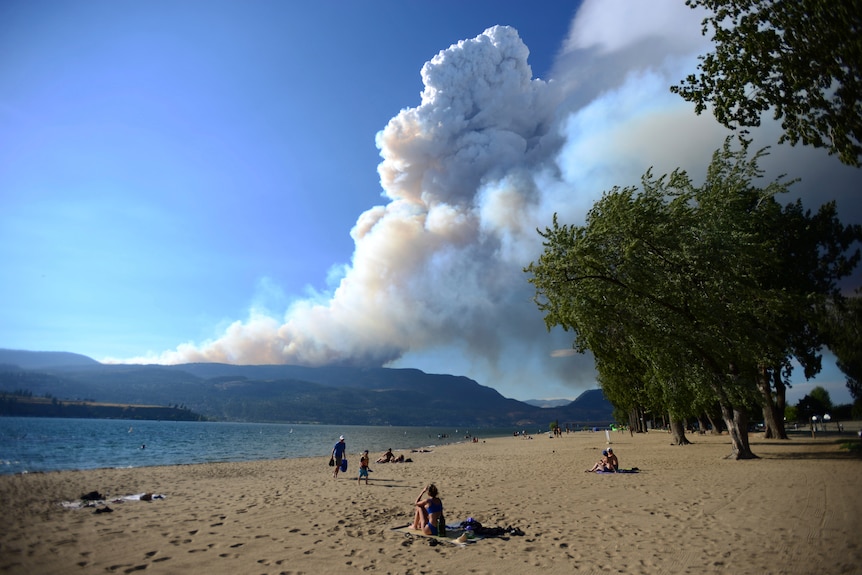 Smoke behind ocean 