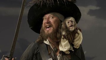 Geoffrey Rush as Captain Barbossa with his pet monkey