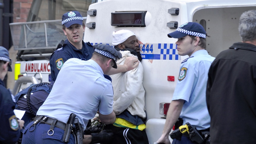 A violent clash with police at a protest is always a PR disaster (AAP: Louis Allen)