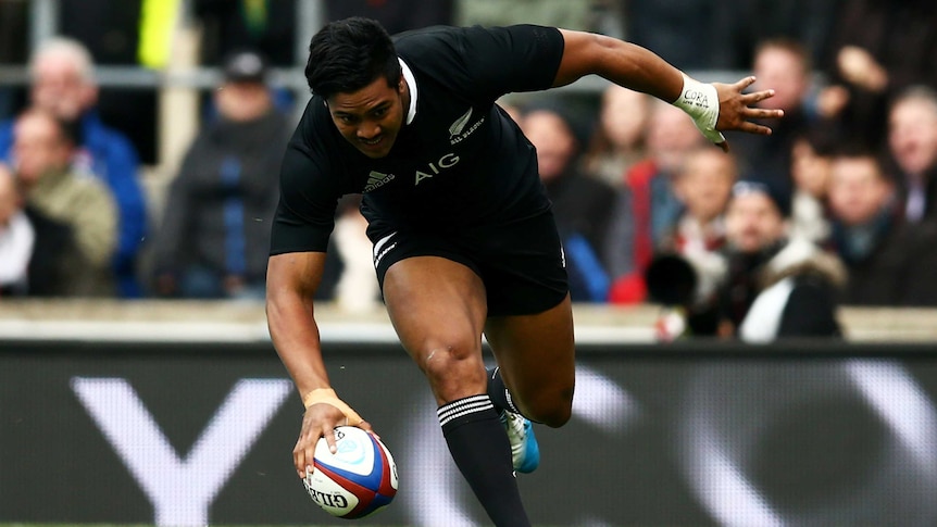 On song ... Julian Savea scores his first try for the All Blacks