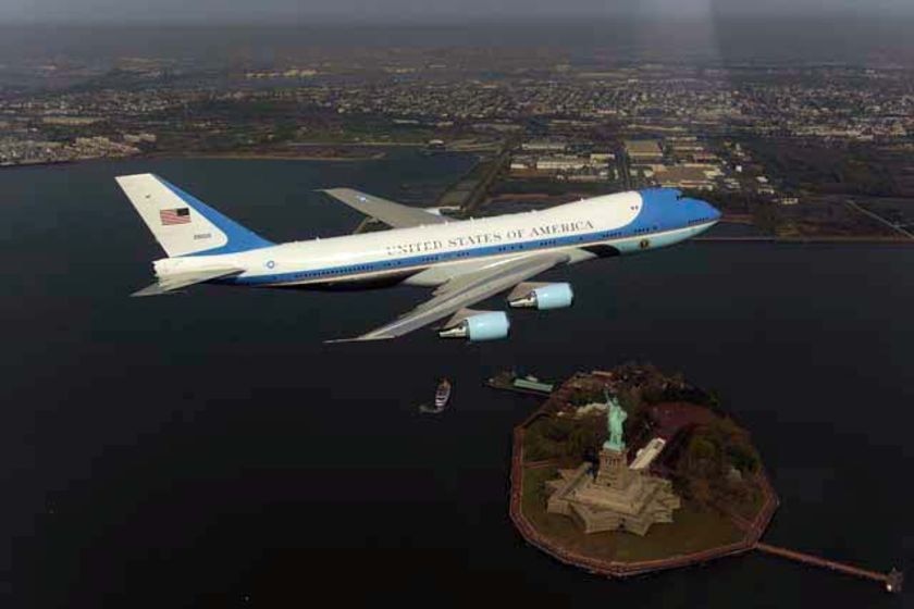 Air Force One flying over New York and the Statue Of Liberty