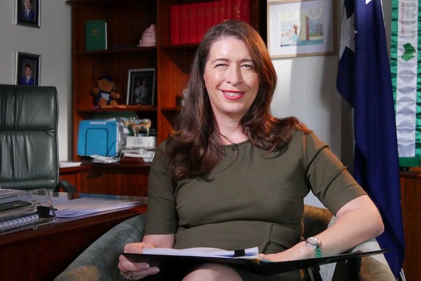 Queensland Nationals senator and former butcher Susan McDonald sitting in her electorate office.