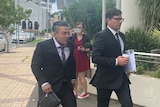 two men men walking into court