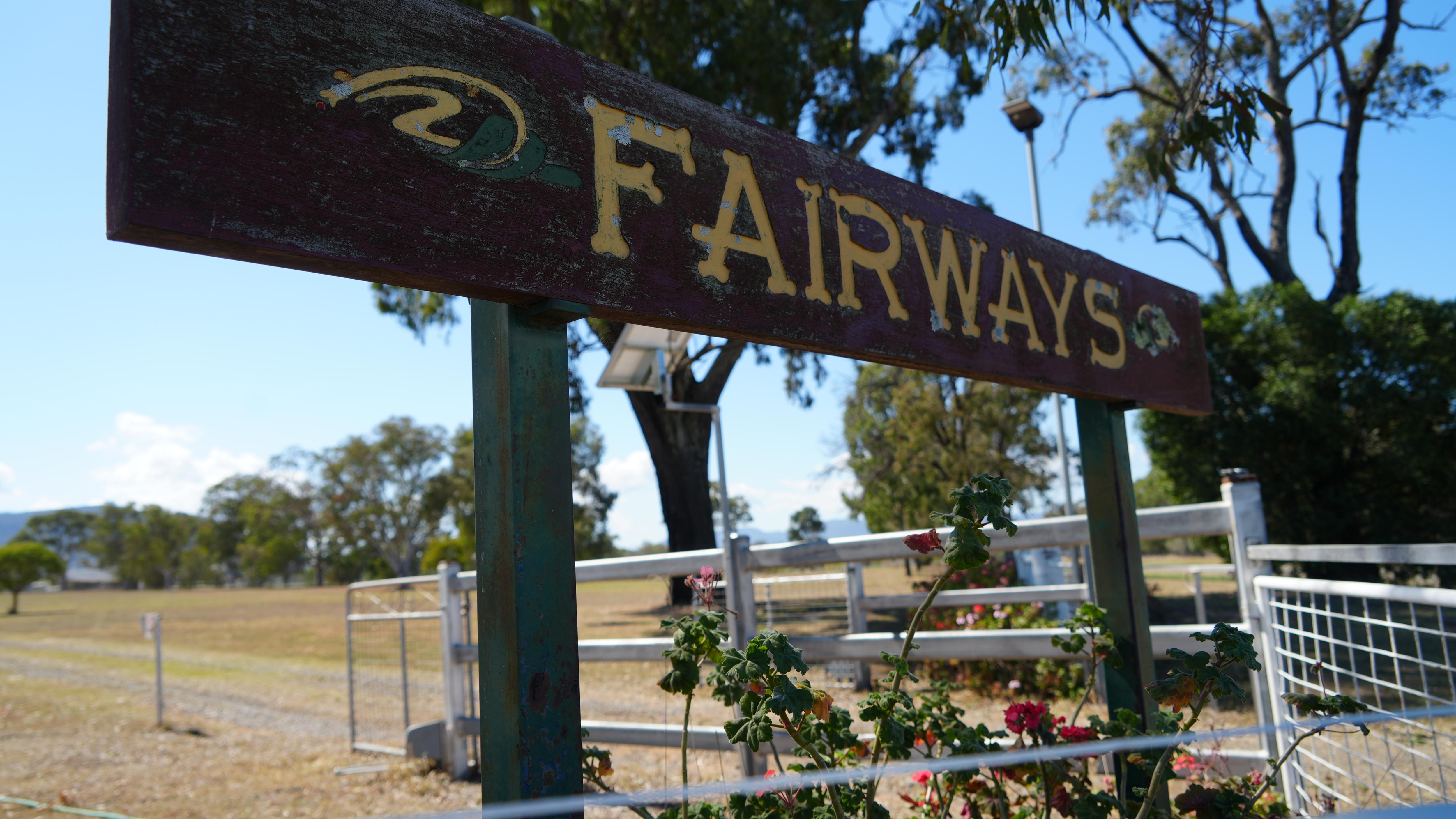 Fairway sign on farm property