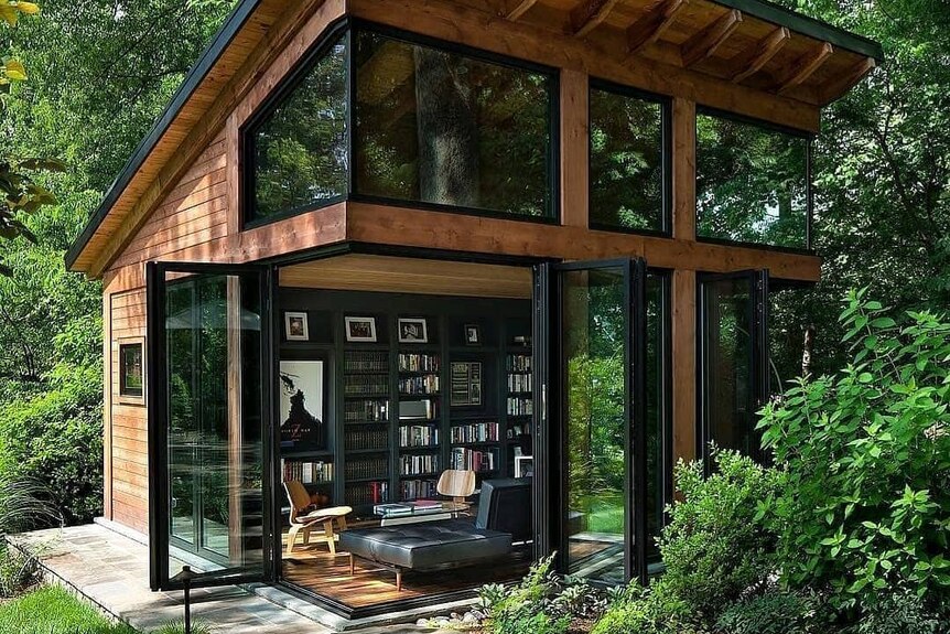 A tiny house in the woods.