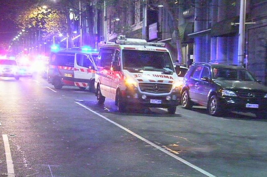 Several ambulances outside a nightclub in King Street, Melbourne where a man and woman were shot by police.