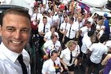 Brad Harker and dozens of others dressed as missionaries in the Peacock Mormons float at the 2018 Mardi Gras Parade.