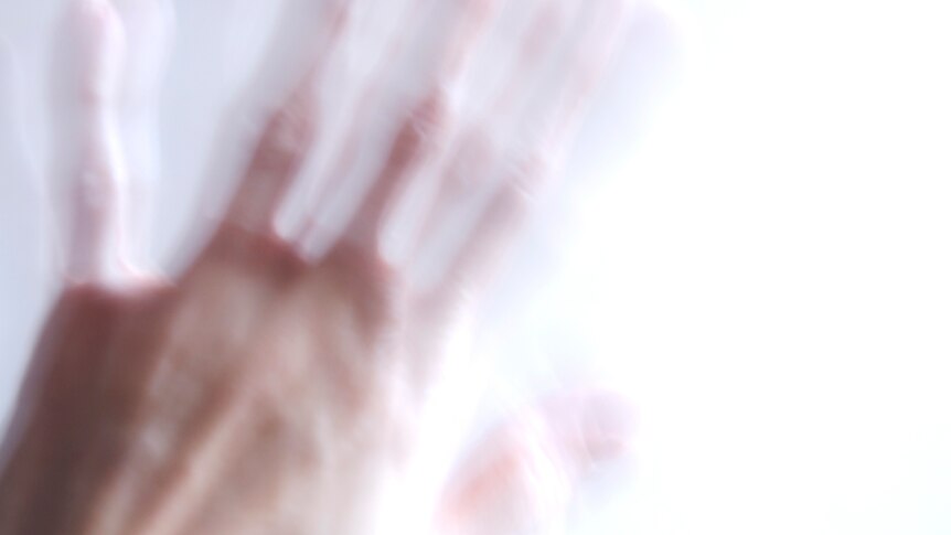 Blurred female hand