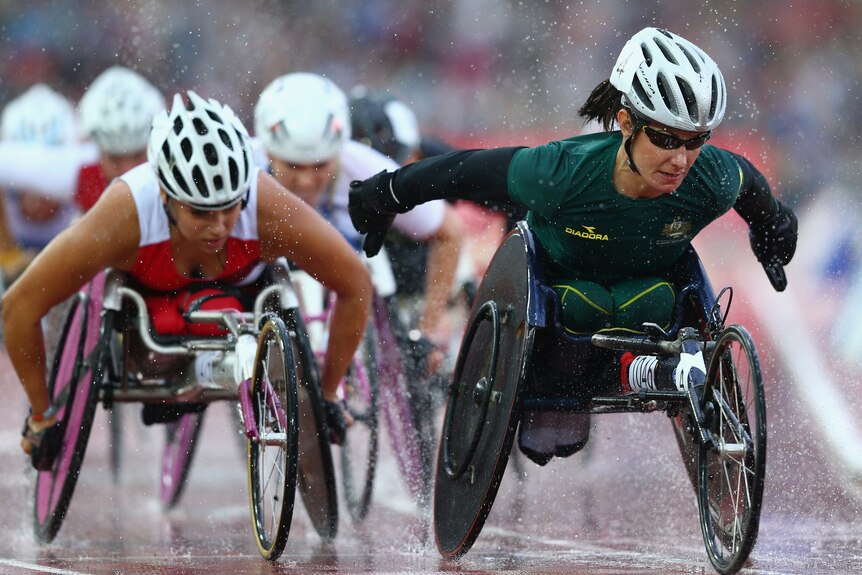 Christie Dawes competes in the rain in the Women's T54 1500 metres final.