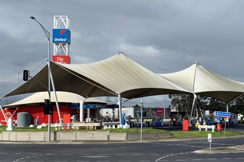 The North service station of the West Gate Freeway in front of a grey sky.