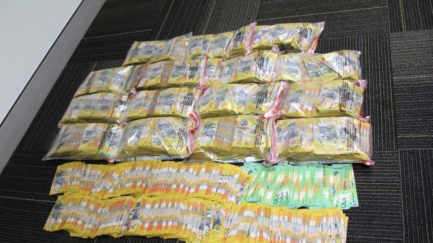 Bundles of cash that was found in a car by police in Perth.