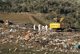 Police and SES volunteers search Launceston tip for body parts