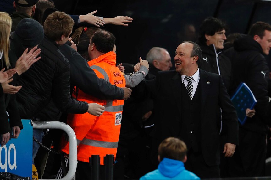 Manager Rafael Benitez celebrates Newcastle United's promotion to the Premier League