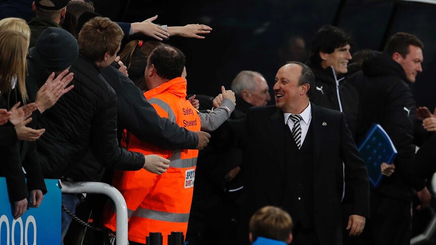 Manager Rafael Benitez celebrates Newcastle United's promotion to the Premier League