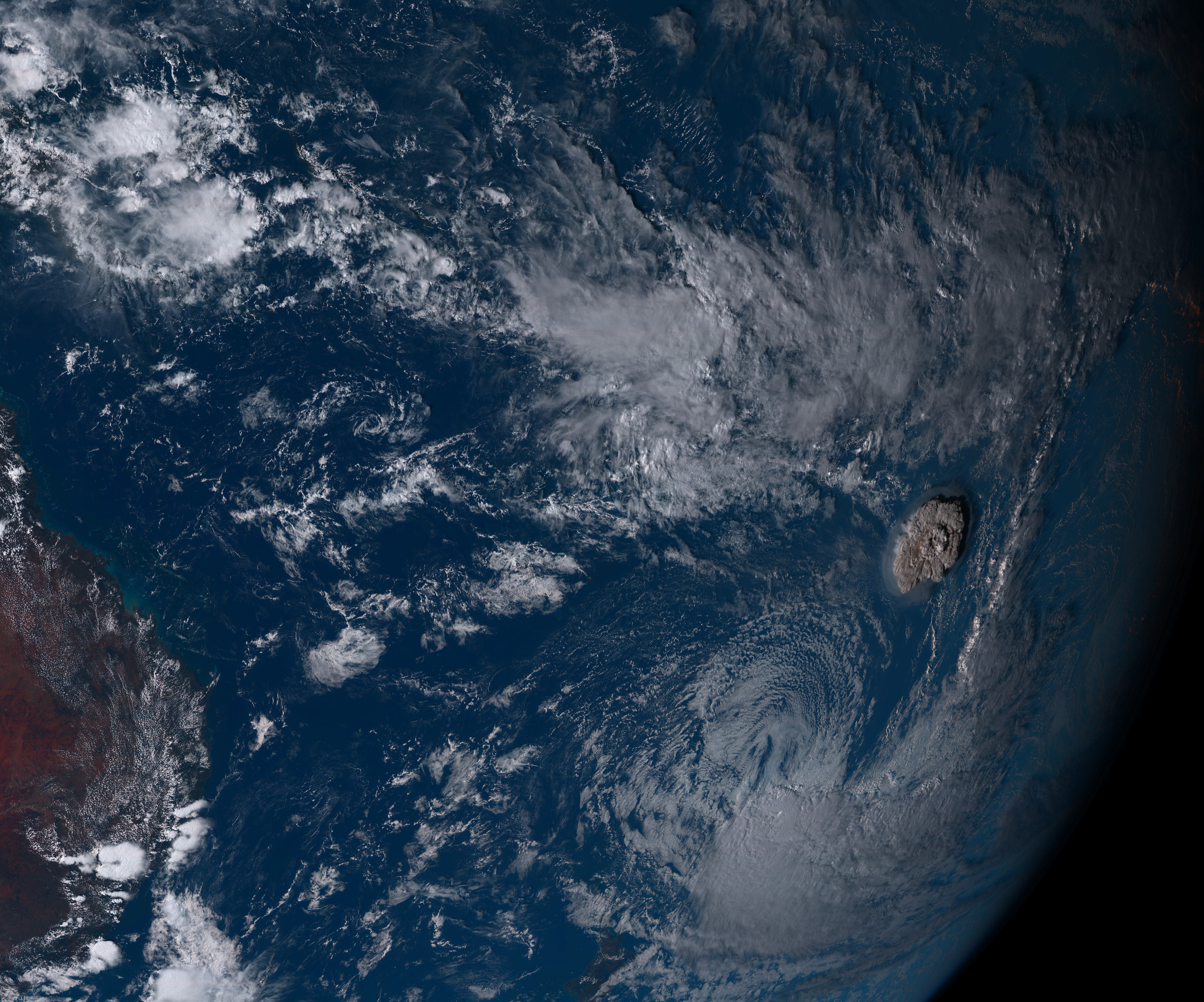 The ash cloud has grown in size, looming over the Pacific Ocean in this satellite image.